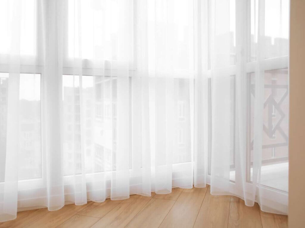 sheer curtains | bay window treatment ideas