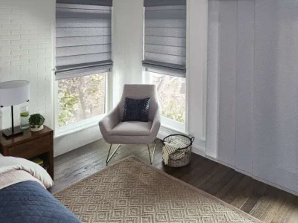 Graber sliding panel paired with Roman shades
