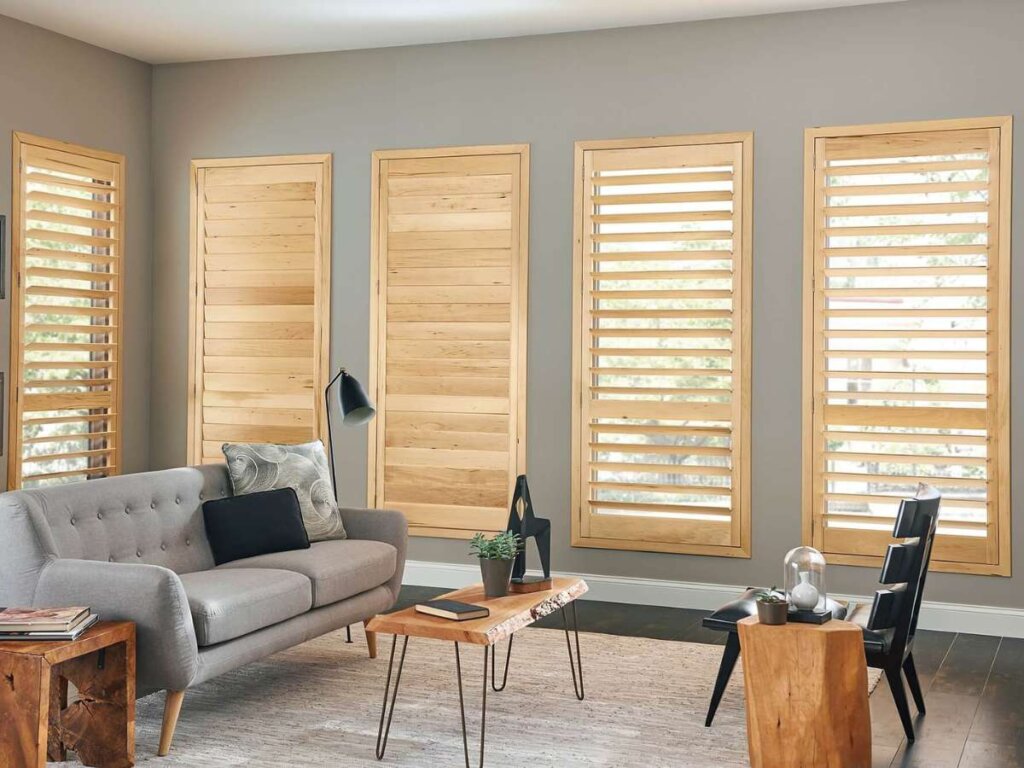 Natural Graber Wood Shutters Beautifying the Living Room